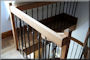 Alder well rail with oil rubbed bronze balusters